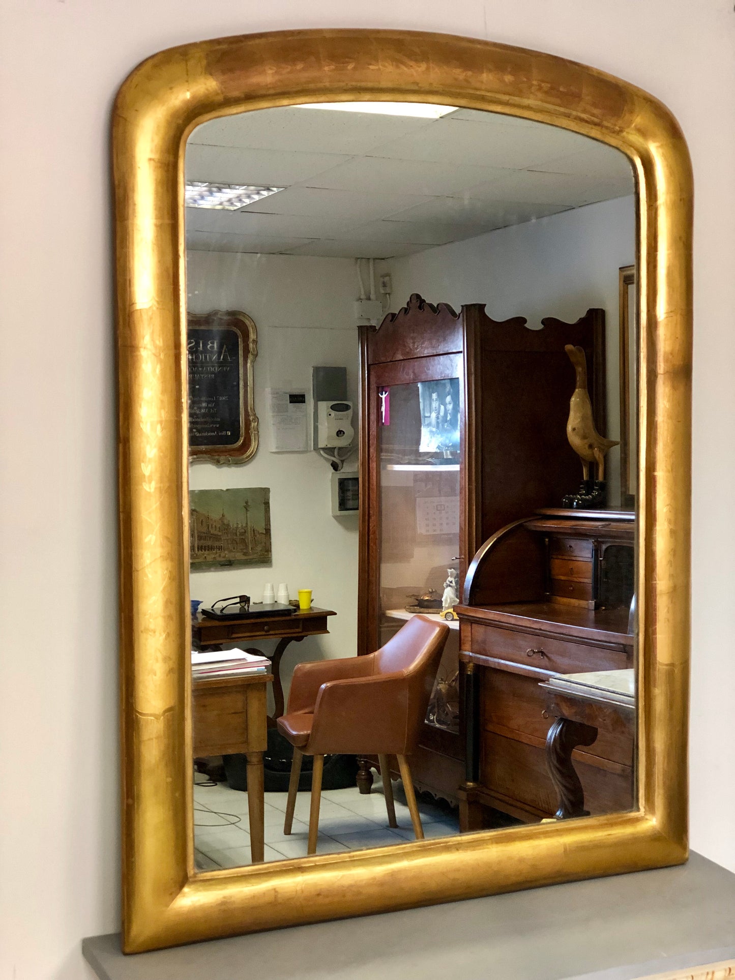 Specchiera in foglia oro lombarda con incisioni floreali . XIX secolo