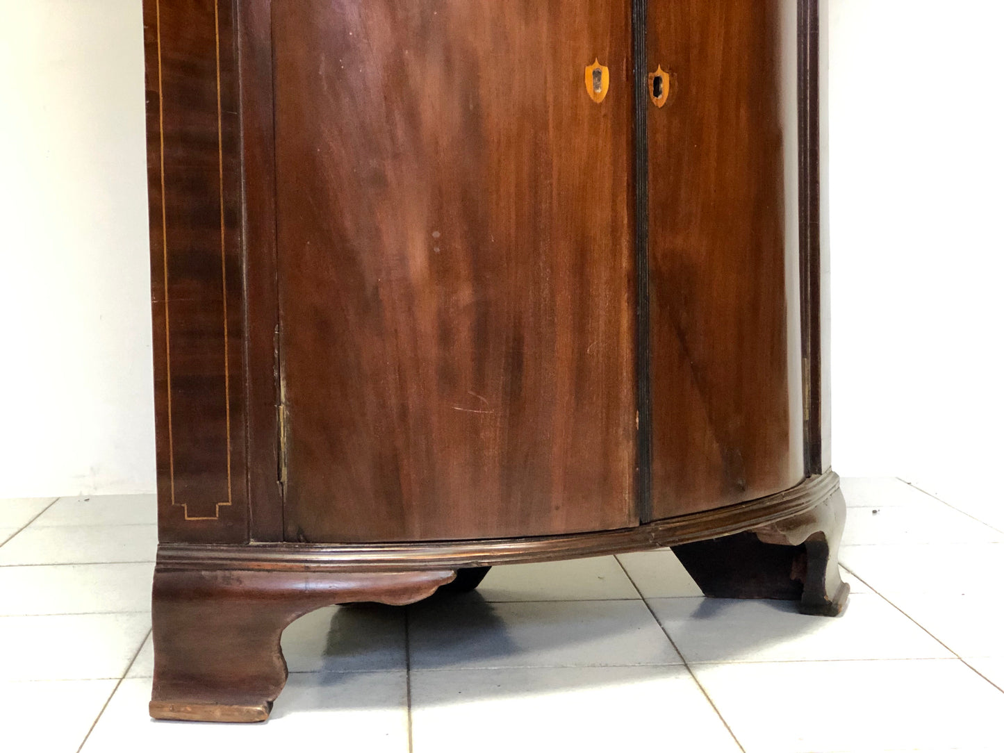 Inlaid curved corner cabinet, mid 19th century