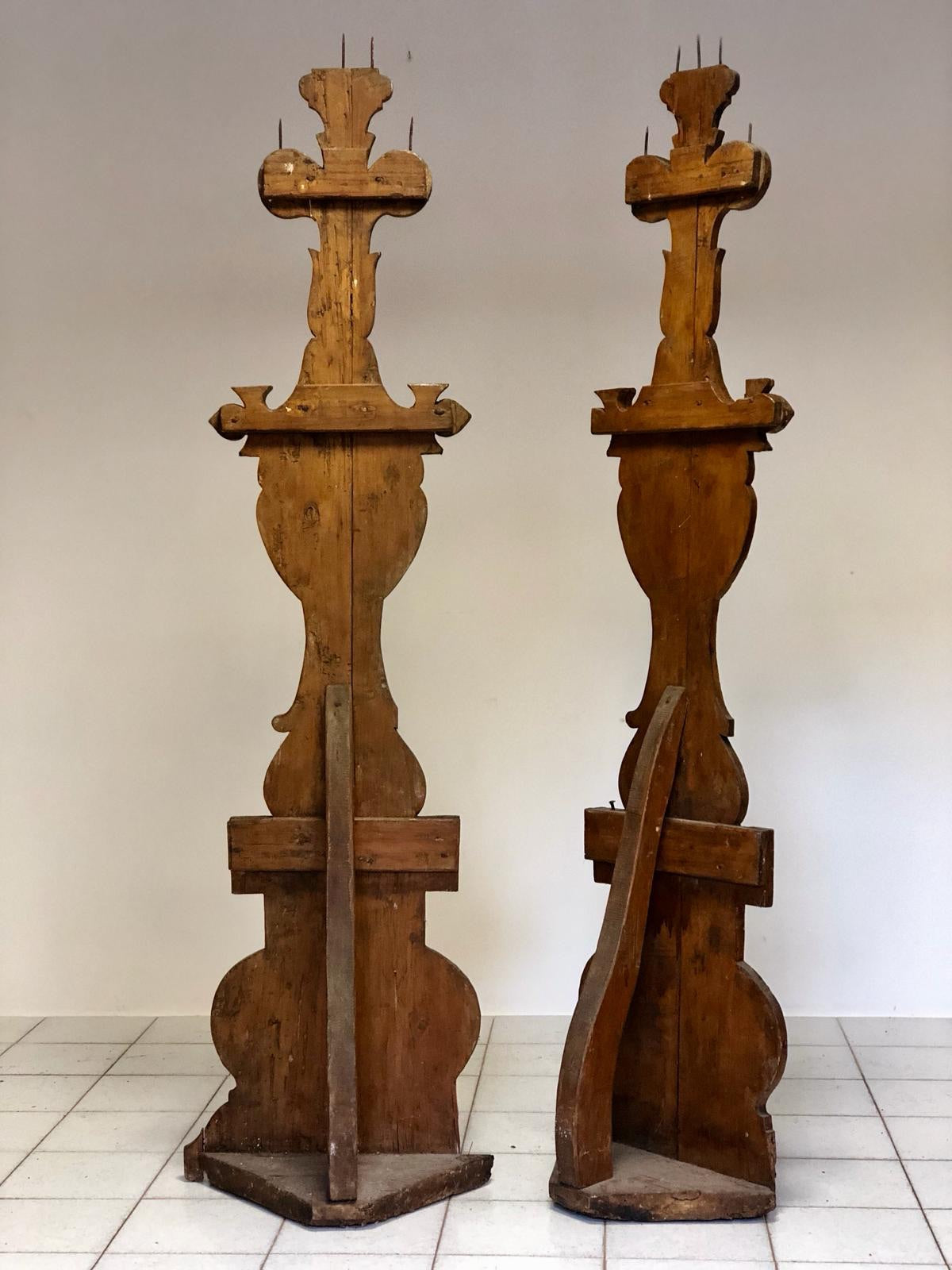 Pair of lacquered and painted torches. Marche, early 18th century