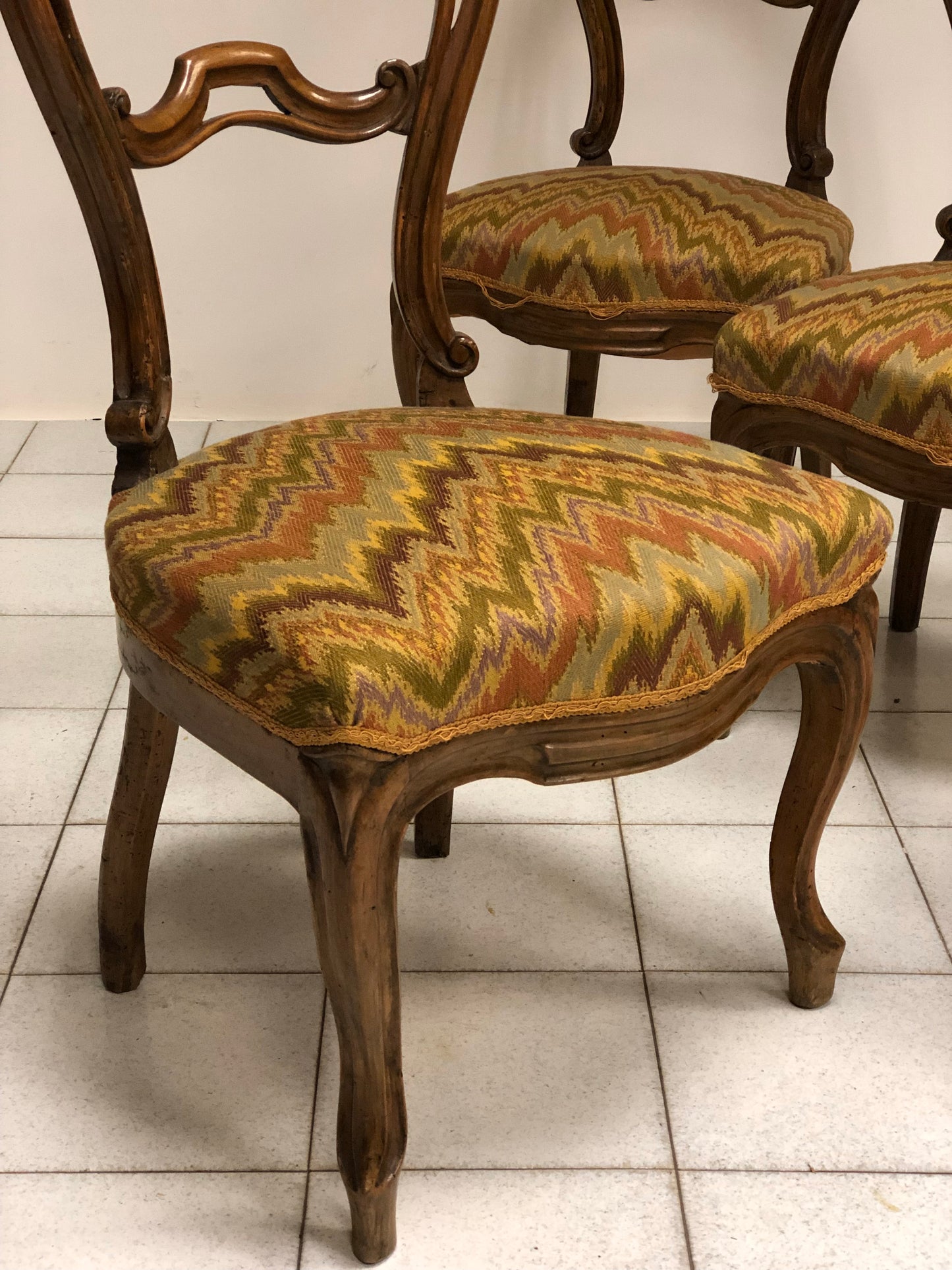 Group of four Lombard walnut chairs, mid 19th century