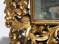 Specchiera in legno intagliato e dorato . Modena Bologna primi 700