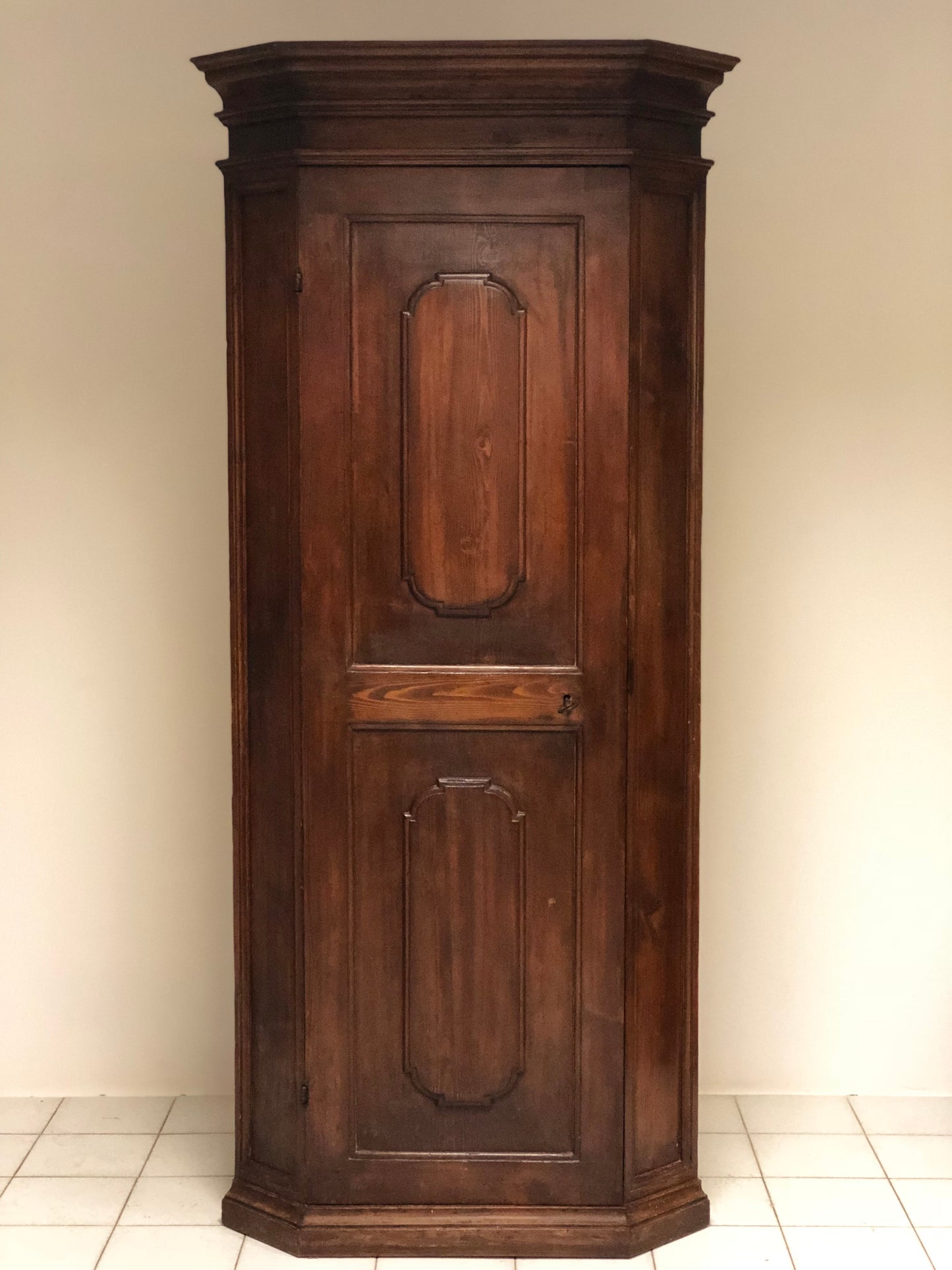 Emilian rusticated corner cupboard. 17th century