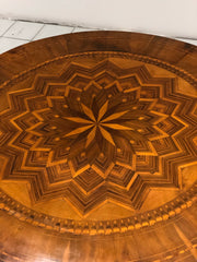 Tavolo di Rolo intarsiato . 110 cm diametro