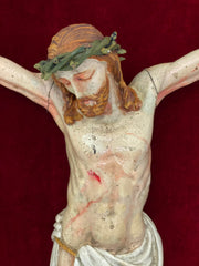 Cristo ligneo con cornice dorata coeva . Lombardia XVIII secolo