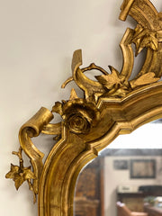 Specchiera in legno intagliato e dorato. Lombardia primo 800