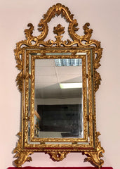 Specchiera in legno intagliato e dorato. Venezia XIX secolo