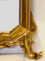 Specchiera in legno intagliato e dorato. Lombardia primo 800