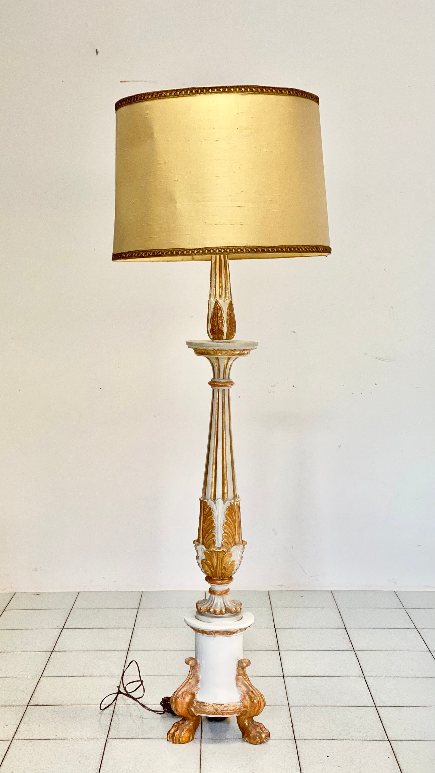 Empire period gilded lacquered candlestick. Early 19th century