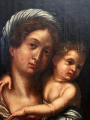 Olio su tavola Madonna con il bimbo e santo vescovo Lombardia XVI secolo