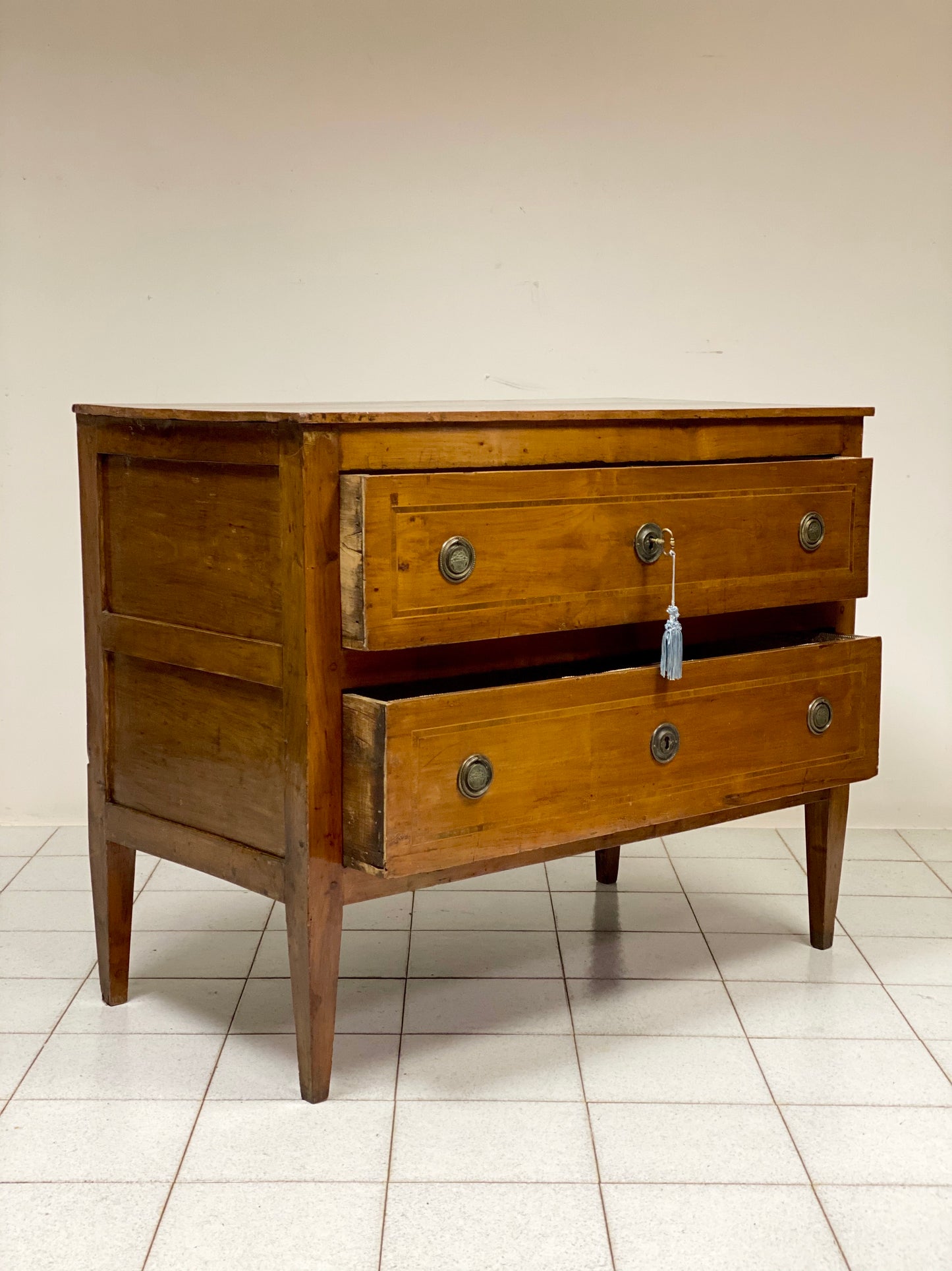 Inlaid cherry directorate chest of drawers. Lombardy, early 19th century