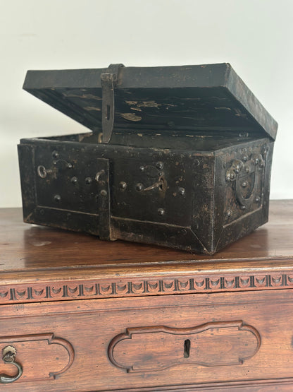 Small studded iron travel chest. Early 19th century