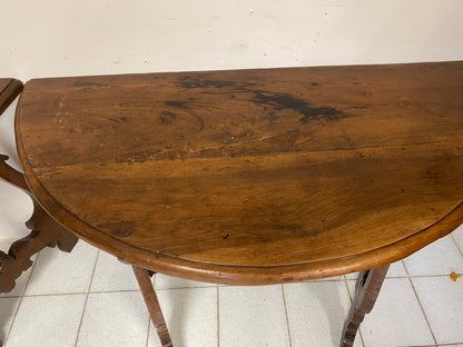 oval table formed by two lyre-shaped half consoles. Lombardy, late 17th century