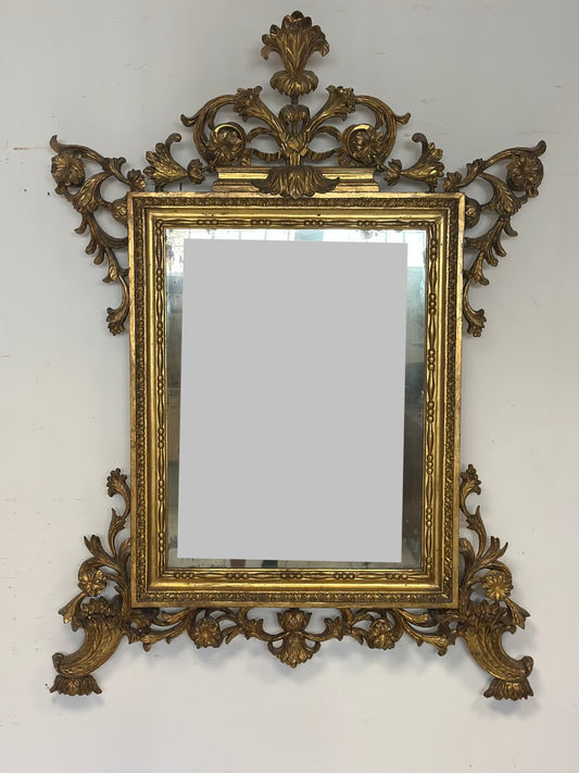 Specchiera Luigi XV in legno intagliato e dorato .
Vetro al mercurio Lombardia inizio XVIII secolo 148
X 112