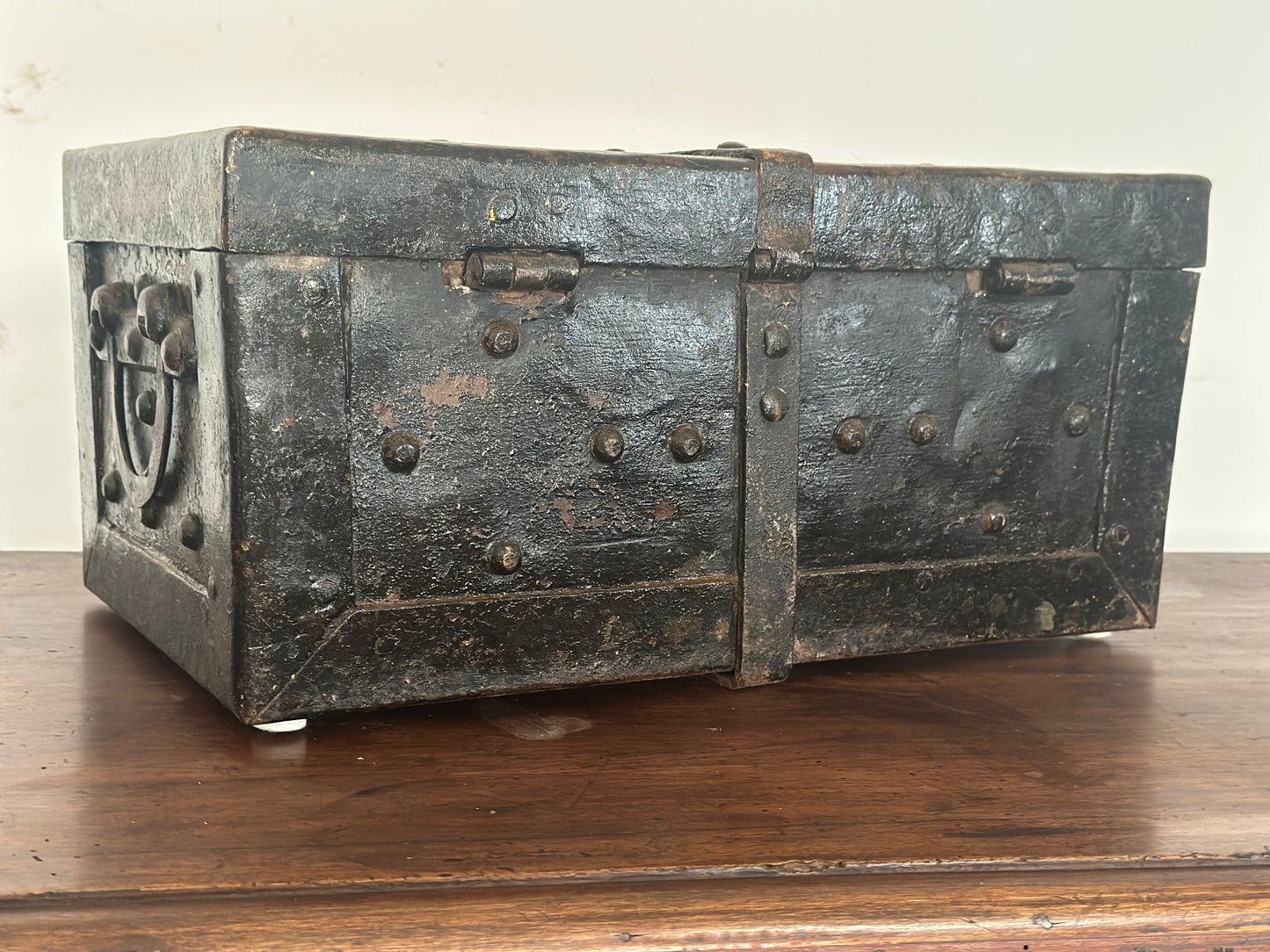 Small studded iron travel chest. Early 19th century