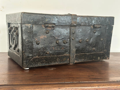 Small studded iron travel chest. Early 19th century
