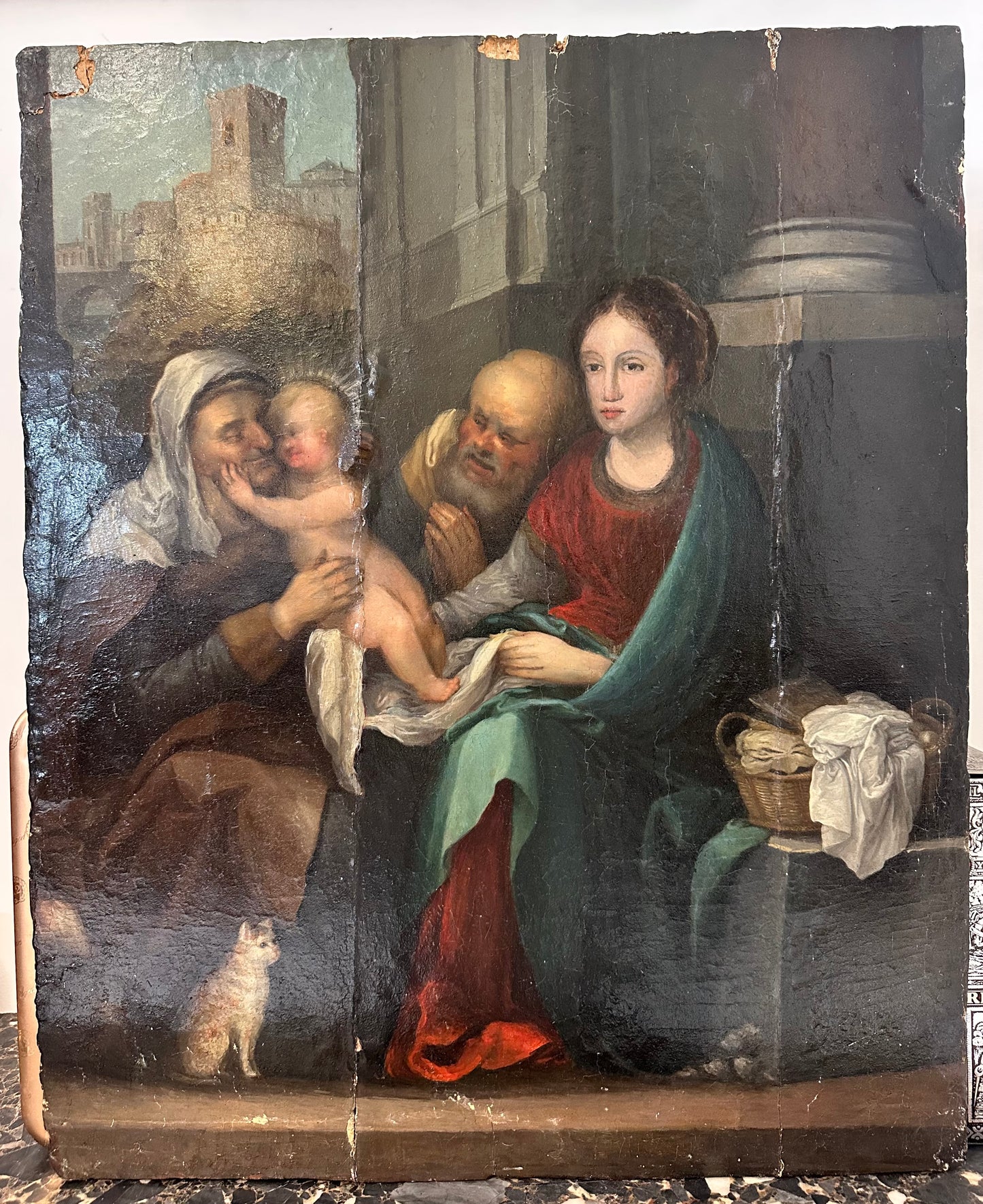 Olio su tavola . Sacra famiglia con sant’Anna e paesaggio urbano   Epoca 500