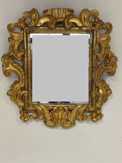 Specchiera emiliana in legno intagliato e dorato   Barocco XVII secolo