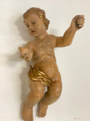 Putto ligneo cherubino scolpito laccato e dorato . XVII secolo Lombardia