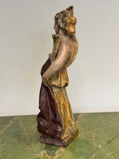 Scultura lignea di angelo con cornucopia reggicero policromo . Epoca fine 600
