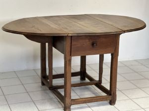 Walnut hinged table. 17th century