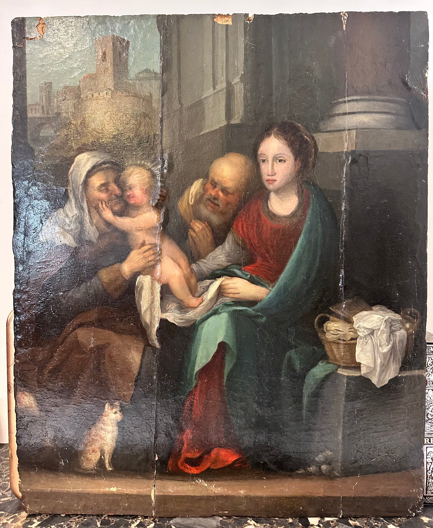 Olio su tavola . Sacra famiglia con sant’Anna e paesaggio urbano   Epoca 500