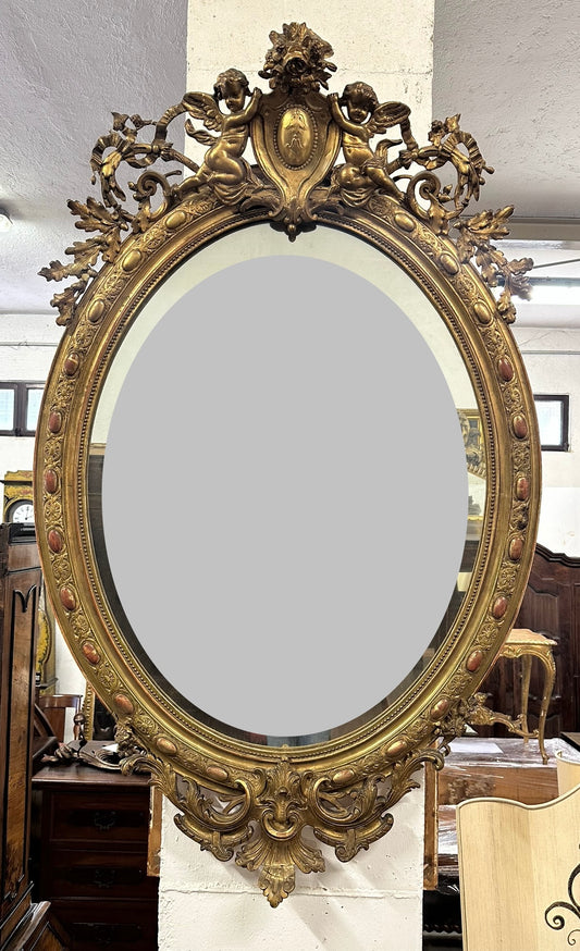 Specchiera lombarda ovale legno intagliato dorato.  Primi 800.  155 x 98