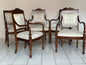 Gruppo di cinque poltrone lombarde Carlo X in noce. Prima metà XIX secolo. Restaurate