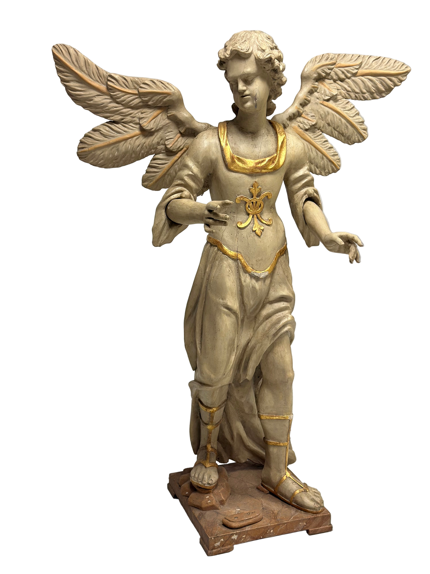 Angelo alato in legno intagliato e dorato . Siena XVIII secolo.  H 136 cm