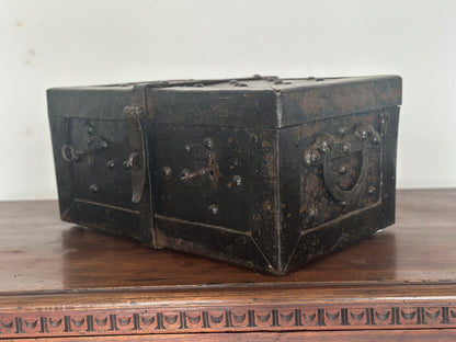 Small studded iron travel chest. Early 19th century