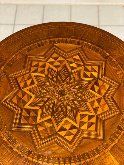 Inlaid Rolo table. 19th century