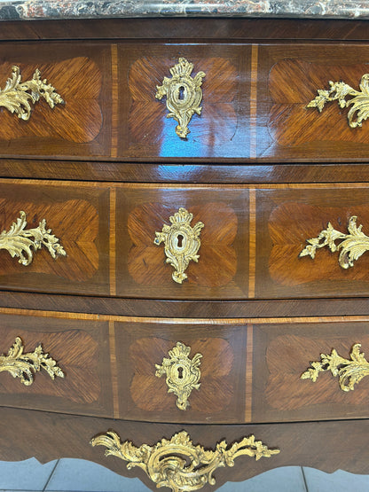 Cassettone a forma bombata bois  de rosa ebano viola 
XIX secolo Napoleone III (restaurato)