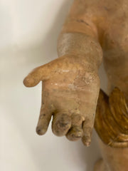 Putto ligneo cherubino scolpito laccato e dorato . XVII secolo Lombardia