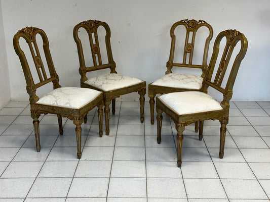Gruppo di quattro sedie Luigi XVI laccate e dorate.  XVIII secolo.  Restaurate