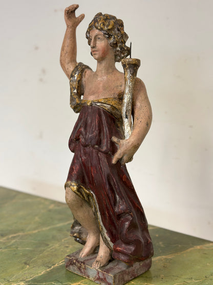 Scultura lignea di angelo con cornucopia reggicero policromo . Epoca fine 600