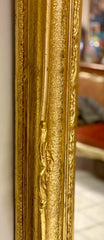 Specchiera lombarda a cabaret in legno intagliato dorato XIX secolo . 133 x 107