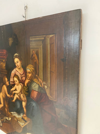 Olio su tavola. Sacra famiglia con Sant’Anna e San Giovannino . XVI secolo