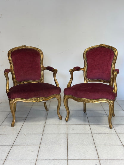 Coppia di poltrone in legno intagliato e  dorato.   Lombardia XIX secolo