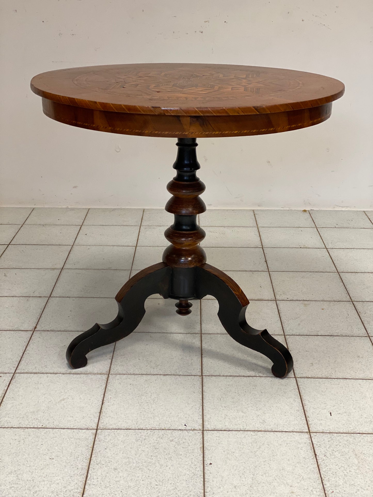 Inlaid Rolo table. 19th century