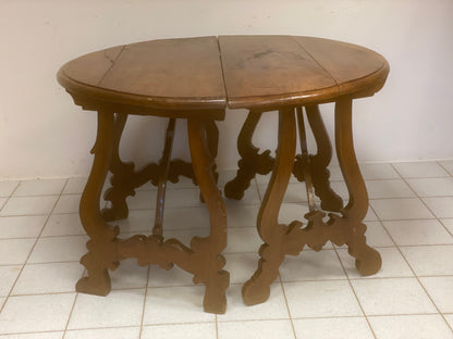 oval table formed by two lyre-shaped half consoles. Lombardy, late 17th century