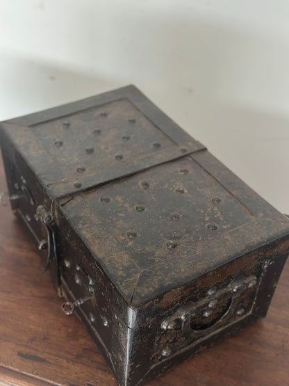 Small studded iron travel chest. Early 19th century