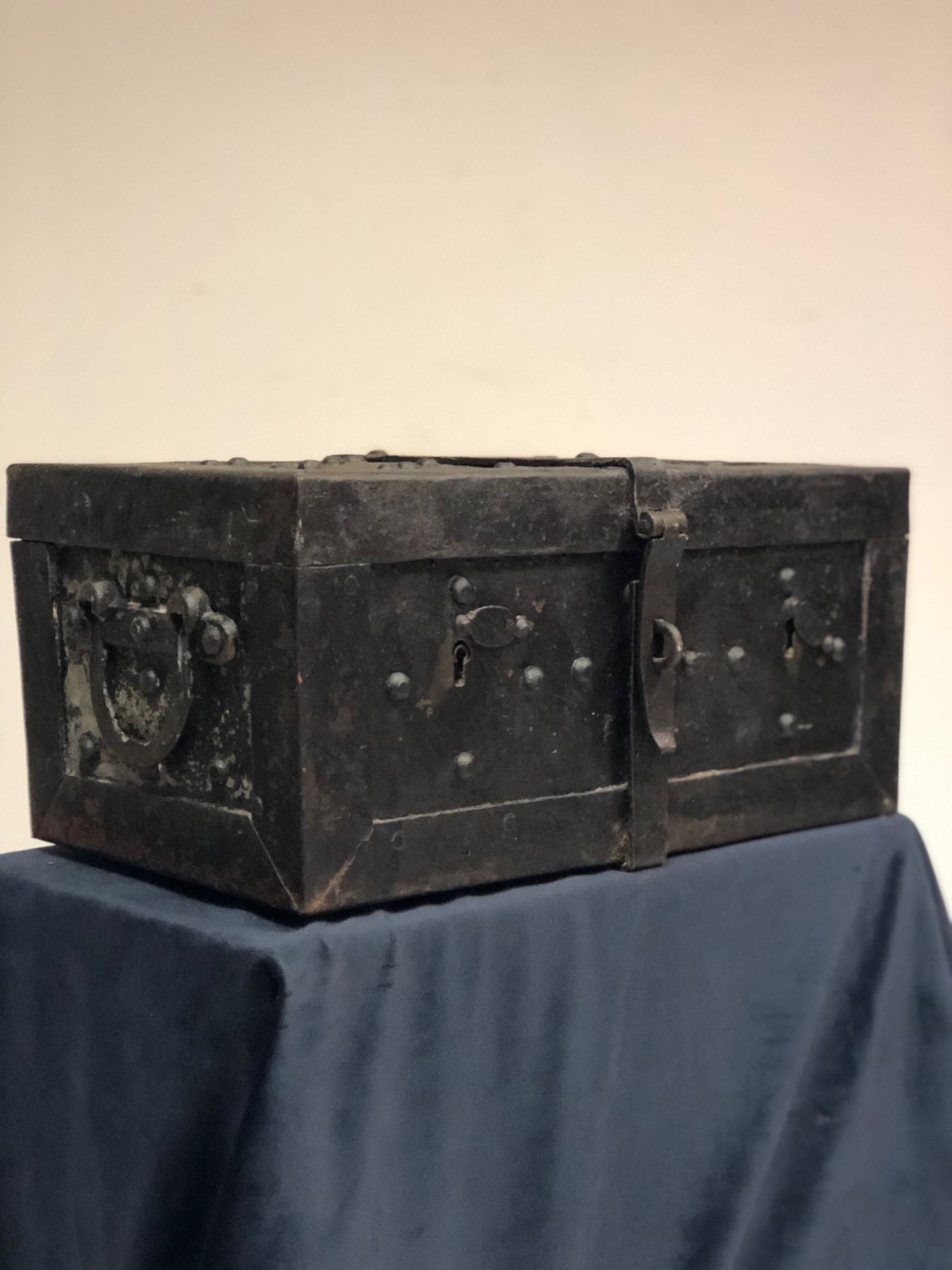 Small studded iron travel chest. Early 19th century