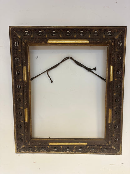 Cornice in legno traforato dorato ebanizzato.
Lombardia prima metà 800. 108 x 92