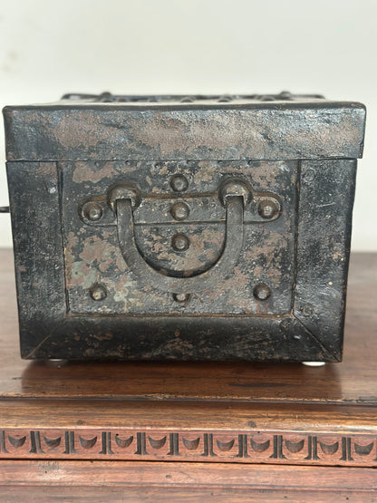 Small studded iron travel chest. Early 19th century