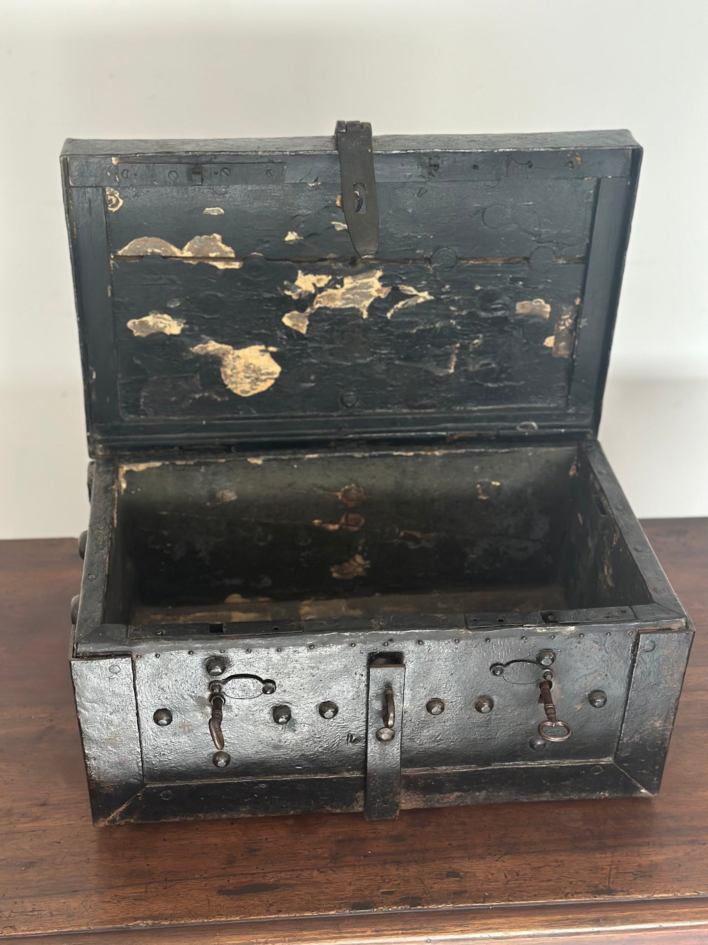 Small studded iron travel chest. Early 19th century