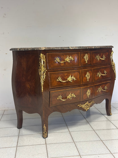 Cassettone a forma bombata bois  de rosa ebano viola 
XIX secolo Napoleone III (restaurato)