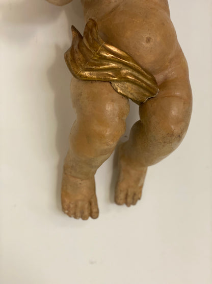 Wooden cherub putto carved, lacquered and gilded. 17th century Lombardy