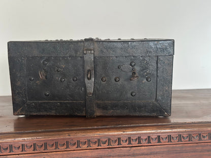 Small studded iron travel chest. Early 19th century
