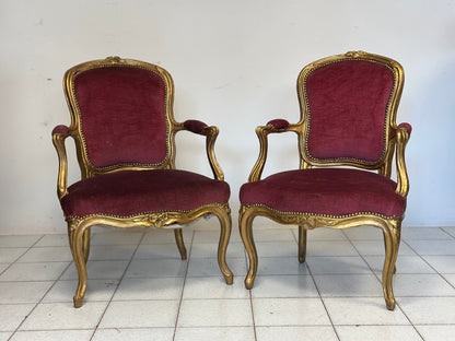 Coppia di poltrone in legno intagliato e  dorato.   Lombardia XIX secolo