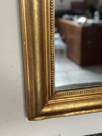 Specchiera  della seconda metà dell’800 in legno dorato Forma rettangolare con angoli stondati