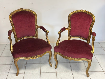 Coppia di poltrone in legno intagliato e  dorato.   Lombardia XIX secolo